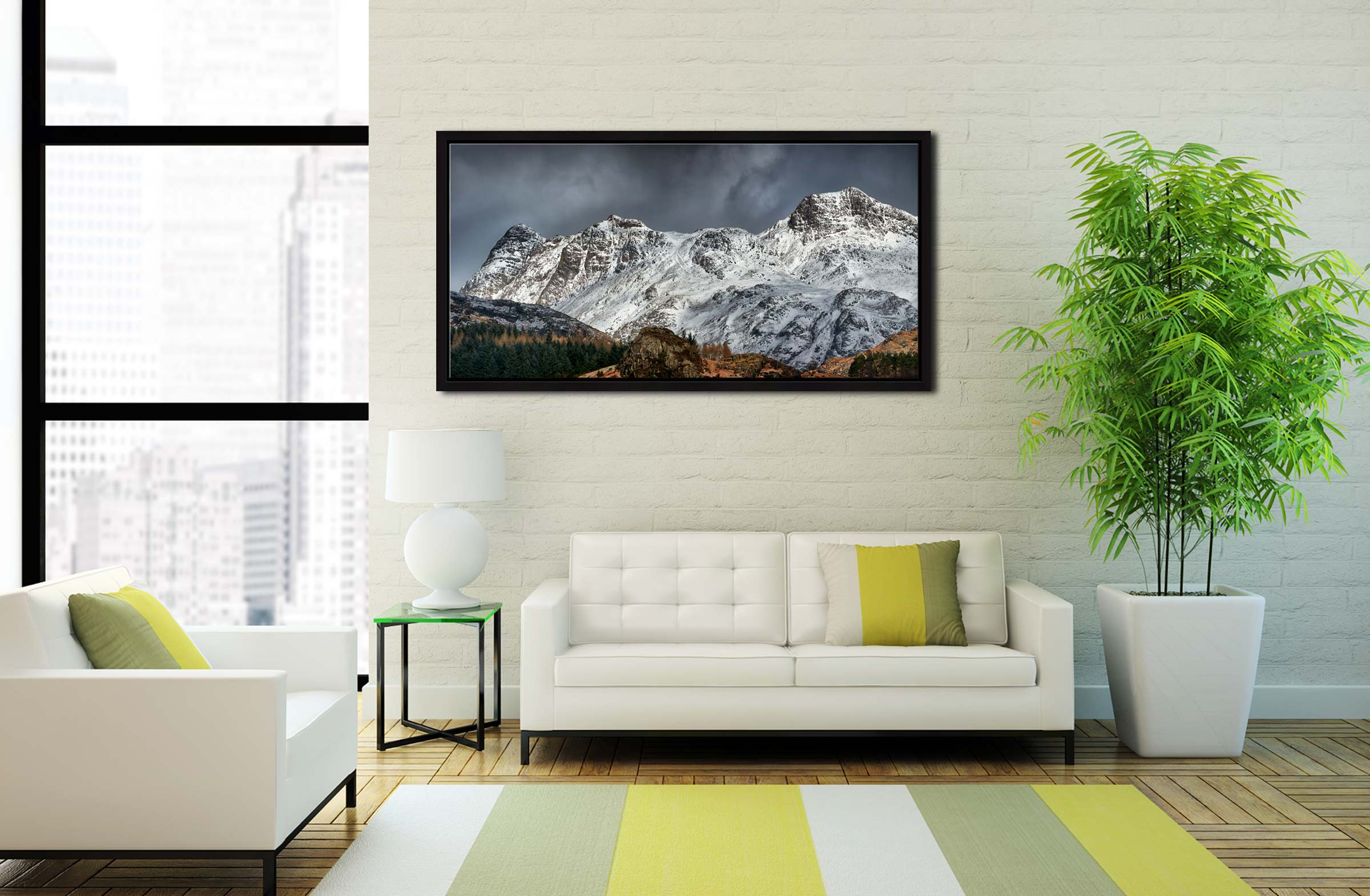 Snow on the Langdales - Black oak narrow framed print on Wall