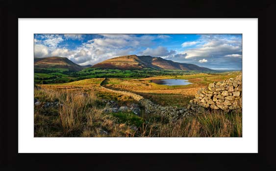 Evening Sun on Tewet Tarn framed print with Mount