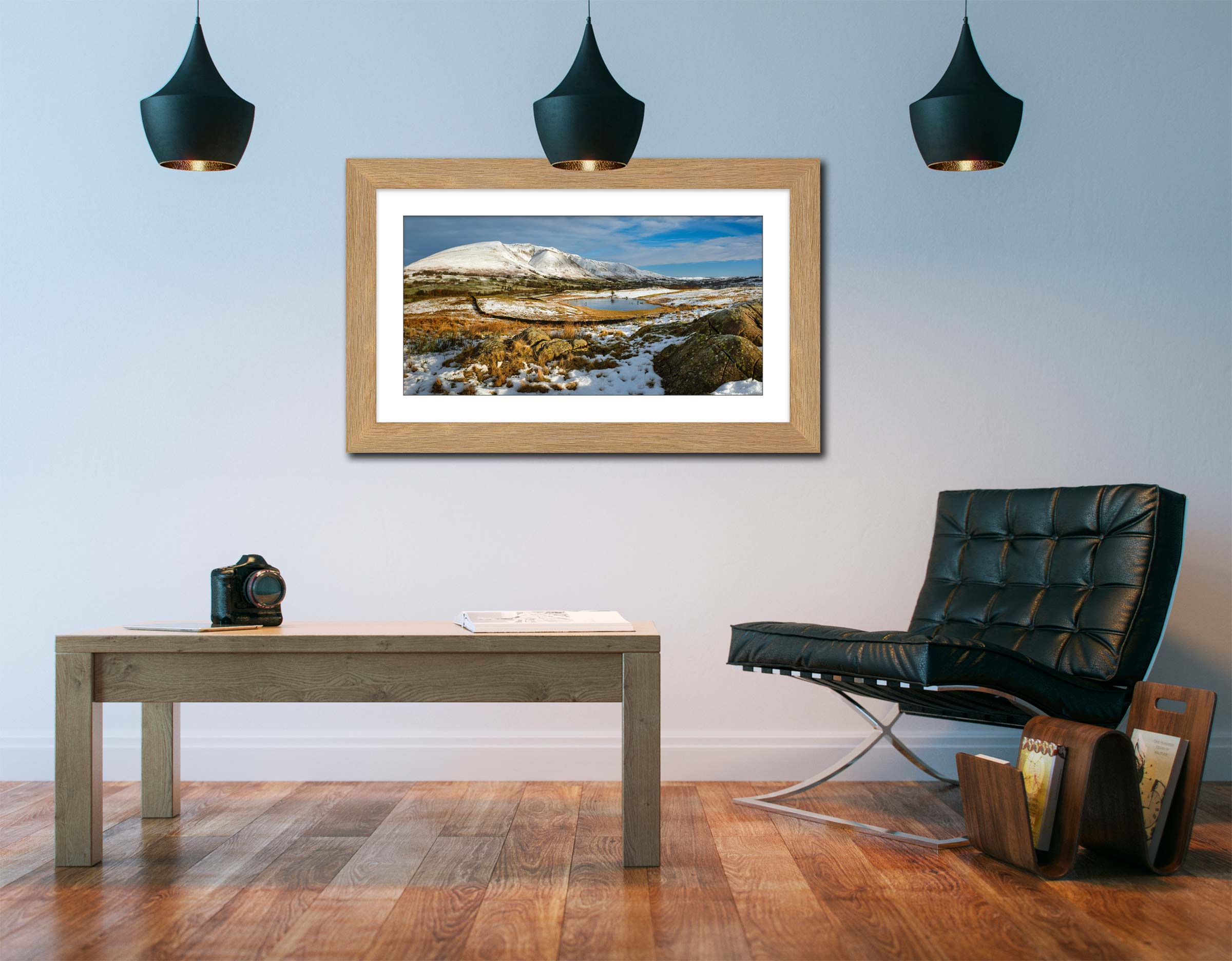 Snowy Tewet Tarn framed print with mount on Wall