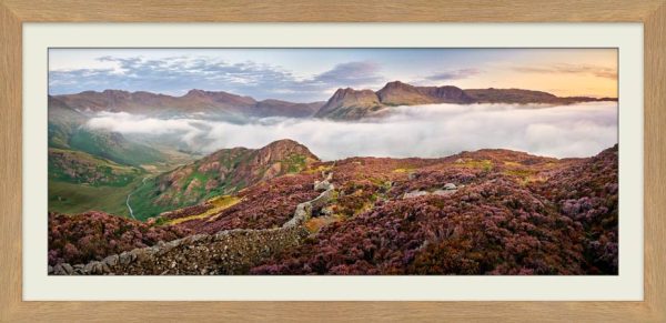 Sunrise Over Heather and Pikes of Langdale framed print with Mount